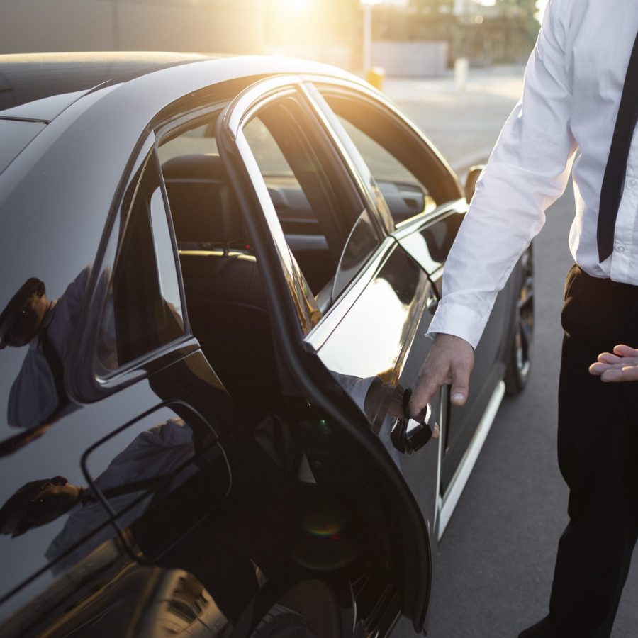 driver-with-opened-car-door(1) driver-with-opened-car-door(1)